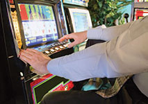 Video Poker Player at Casino